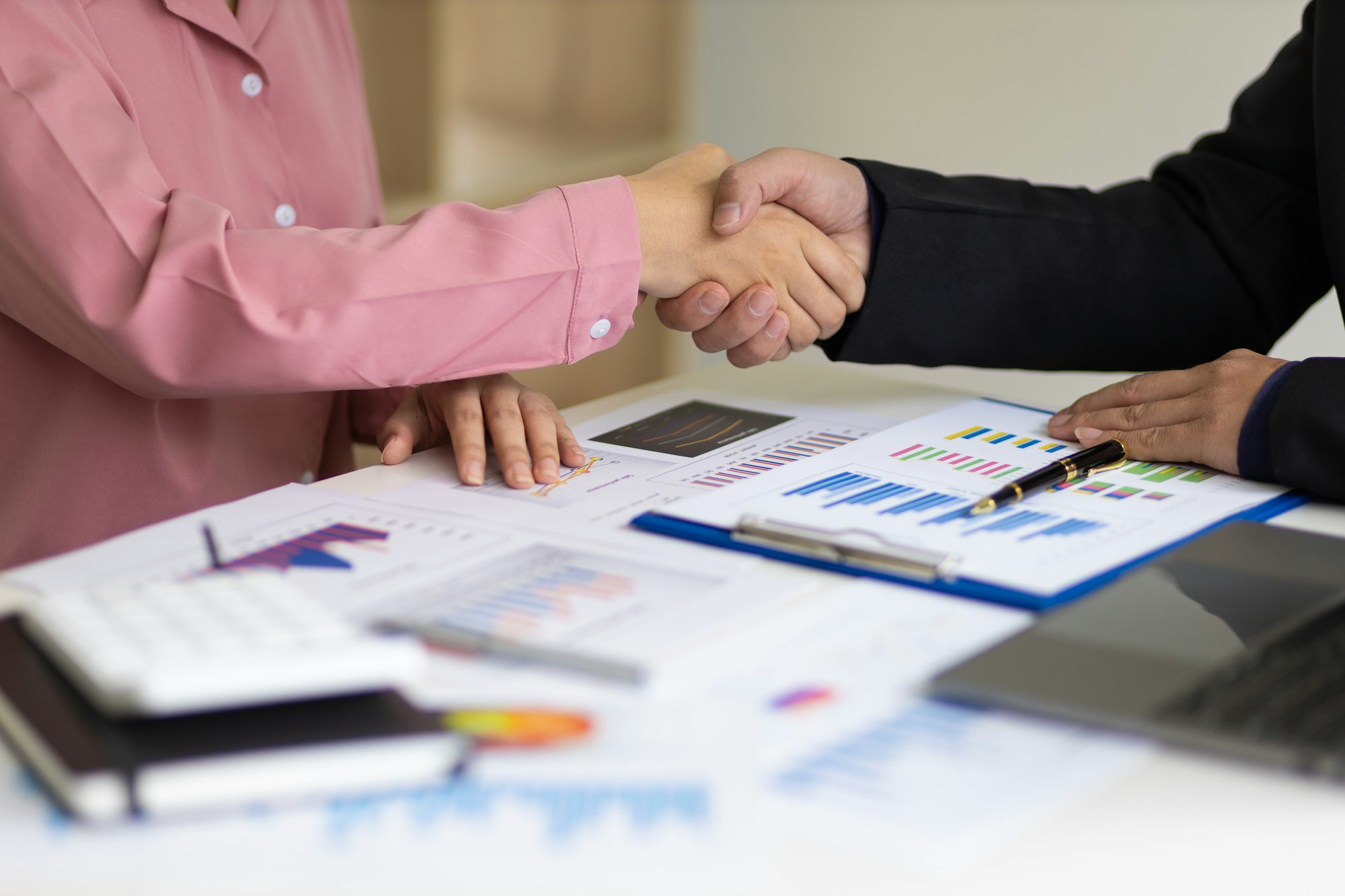 Handshake, business partners shaking hands, business support and cooperation concept.